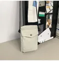 Mini borsa per cellulare in nylon beige con tracolla in corda regolabile e fibbia - Bianco avorio