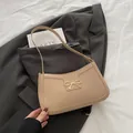 Sac baguette beige en similicuir avec boucle nœud dorée et fine bandoulière élégante - Kaki