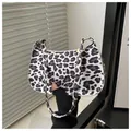 Fashionable leopard print baguette bag with black and white patterns and a gold zipper - White