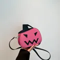 Pink pumpkin crossbody bag with black wizard hat and adjustable shoulder strap - Pink