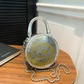 Sac rond argenté avec motif horloge jaune et bandoulière en chaîne métallique - Argent