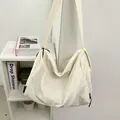 Creamy white nylon crescent crossbody bag with adjustable wide strap and large capacity - Pure White