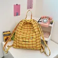 Yellow plaid drawstring backpack with front zipper pocket and Kazevo label detail - Yellow