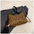 Brown leopard print tote bag with black leather straps and drawstring side details - Brown Leopard