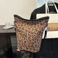 Fashion leopard print bucket bag with black leather trim and adjustable strap - Leopard Coffee