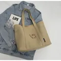 Minimalist khaki canvas tote bag with red embroidery for daily commuting - Khaki