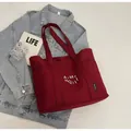 Artistic burgundy canvas tote bag with dual straps and large capacity for women - Red