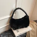 Elegant black faux fur shoulder bag with braided leather handle and pleated design - Black