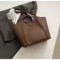 Dark brown pebble leather tote bag with decorative silk scarf and metallic base studs - Coffee