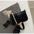 Sac bandoulière noir chic pour femmes avec boucle dorée et bandoulière en perles - Noir Grand