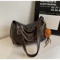 Deep brown pleated tote bag with smooth faux leather finish and cute plush bear charm - Coffee