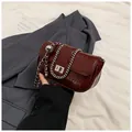Deep red patent leather mini crossbody bag with thick silver chain and large bead charm - Red