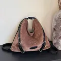 Brown suede triangular shoulder bag with black leather straps and silver metal hardware - Brown and Black