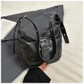 Retro black hobo bag with silver buckle and adjustable strap in matte leather finish - Black