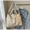 Chic beige quilted nylon tote bag with wave stitching and adjustable wide shoulder strap - Khaki