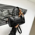 Black pebble leather Boston barrel bag with gold hardware and stylish printed silk scarf - Lychee Texture / Black Type 2