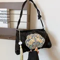 Vintage black velvet handbag with floral embroidery and jade lotus tassel charm - Black