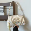 Chinese style cream silk shoulder bag with golden peony embroidery and silk tassels - Off White