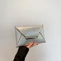 Elegant silver envelope clutch bag with diamond texture and gold metallic trim - Silver