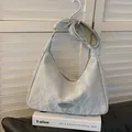 Minimalist light grey wrinkled texture dumpling bag with adjustable shoulder strap - Silver