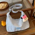 Light blue pleated Hobo shoulder bag with a cute plush doll charm and wide strap - Blue with Pendant