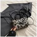 Faux fur leopard print crossbody bag with black leather handles and plush texture - Black Leopard