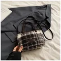 Black and white plaid wool tote bag with brown leather handles and adjustable strap - Brown Plaid