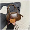 Mini brown Boston handbag in smooth PU leather with teddy pendant and striped scarf - Brown