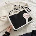 Black velvet tote with white faux fur trim and flower embroidery for women - Black