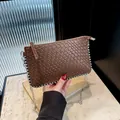Brown woven crossbody bag with silver beaded trim and elegant chain strap for women - Coffee