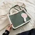 Dark green suede tote bag with white faux fur trim and MIRFNE logo embroidery - Green