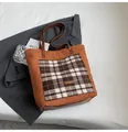 Brown fuzzy faux shearling tote bag with checkered pocket and leather handles - Brown