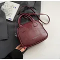 Deep red vintage stitching shoulder bag with silver hardware and adjustable strap - Burgundy