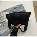 Black quilted nylon chest bag with embroidery and adjustable strap in casual style - Black