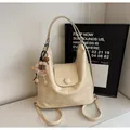 Beige PU leather hobo tote bag with a brown plush sheep charm and magnetic flap cover - Off-White with Pendant
