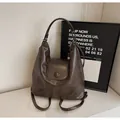 Versatile dark brown vintage tote bag in soft PU leather with multi-way straps and flap - Coffee No Charm