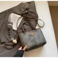 Retro grey tote bag with brown leather straps and a decorative plush pendant - Dark Tea With Charm