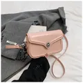 Pink PU leather square crossbody bag with silver twist lock and woven tassel detail - Pink (With Pendant)