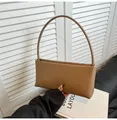 Minimalist light brown rectangular baguette bag with a slim shoulder strap in vegan leather - Khaki