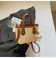 Beige and brown tote bag with butterfly embossing and a plush white charm - With Ornament / Off White