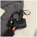 Black lychee texture tote bag with heart pendant and silver chain strap details - With Ornament / Black