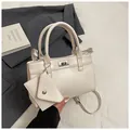 Minimalist off-white rectangular handbag with silver twist lock and mini envelope charm - Off White