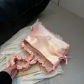 Borsa rosa lucida con manico a nuvola plissettato e logo Muon Shark in vista - Rosa