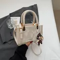 Cream square handbag with marble texture, pearl chain and cute cartoon pendant - Off White