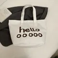 Sac cabas minimaliste en toile blanche avec lettrage marron pour shopping décontracté - Blanc