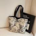 Canvas tote bag in beige with black bamboo ink painting and comfortable wide handles - Off White