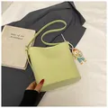 Minimalist light green bucket shoulder bag with pearl chain and cartoon pendant - Green