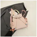 Mini lichtroze nylon rugzak met MeaRey borduursel en trekkoordsluiting - Roze