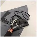 Chic black Boston bag with pearl bow charms and dual front flap pockets detail - With Pendant / Black