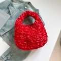 Vibrant red pleated ruffle handbag with silky texture and chic integrated handle design - Red
